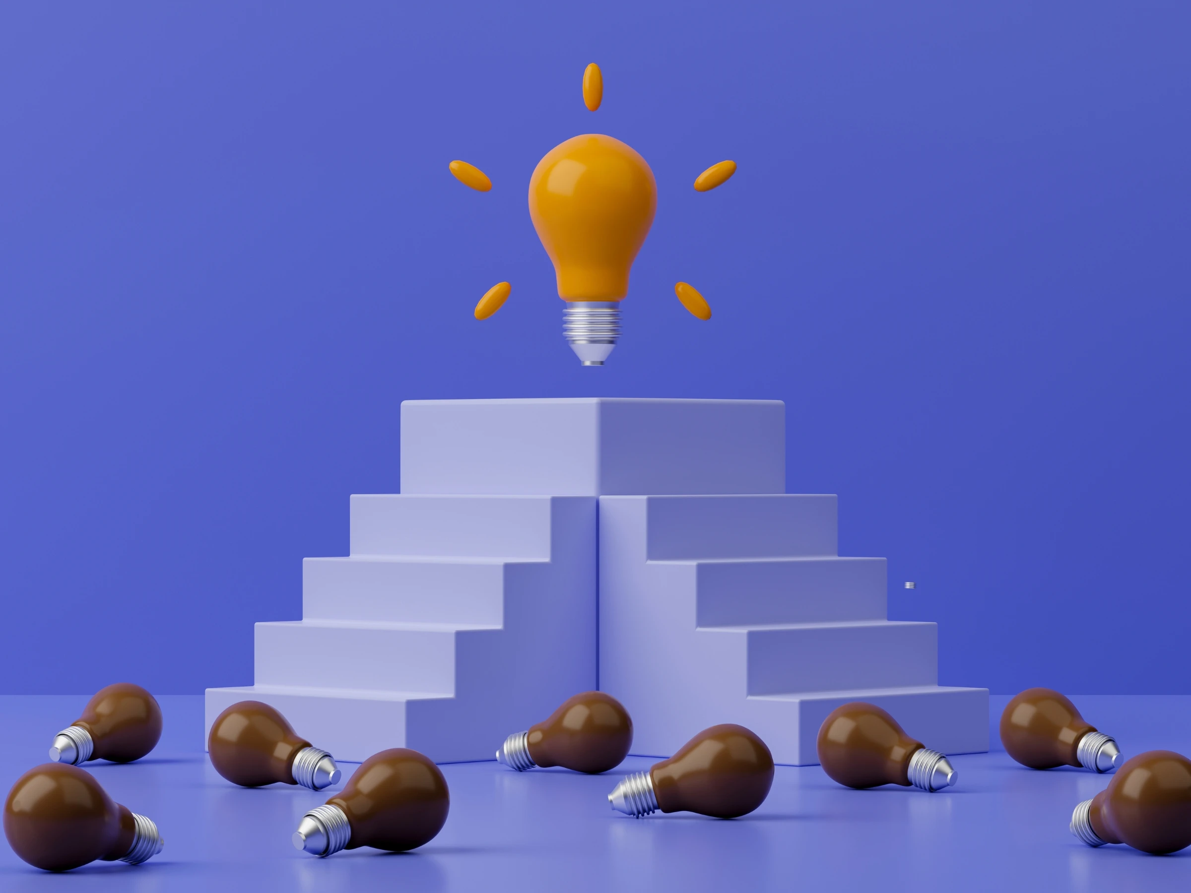 3D illustration of a glowing yellow lightbulb on top of a podium, surrounded by several brown lightbulbs lying on the ground, symbolizing innovation and standing out.
